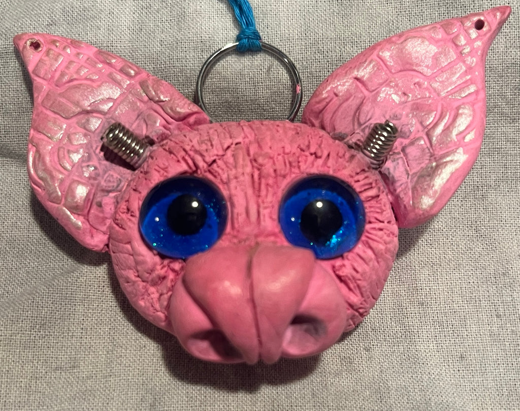 Batticus the bright pink bat original handmade sculpted pendant, front view