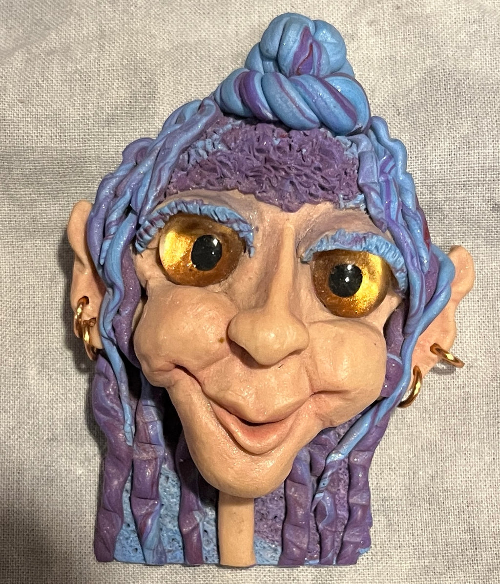 Celina hand-sculpted fae postmistress brooch front view