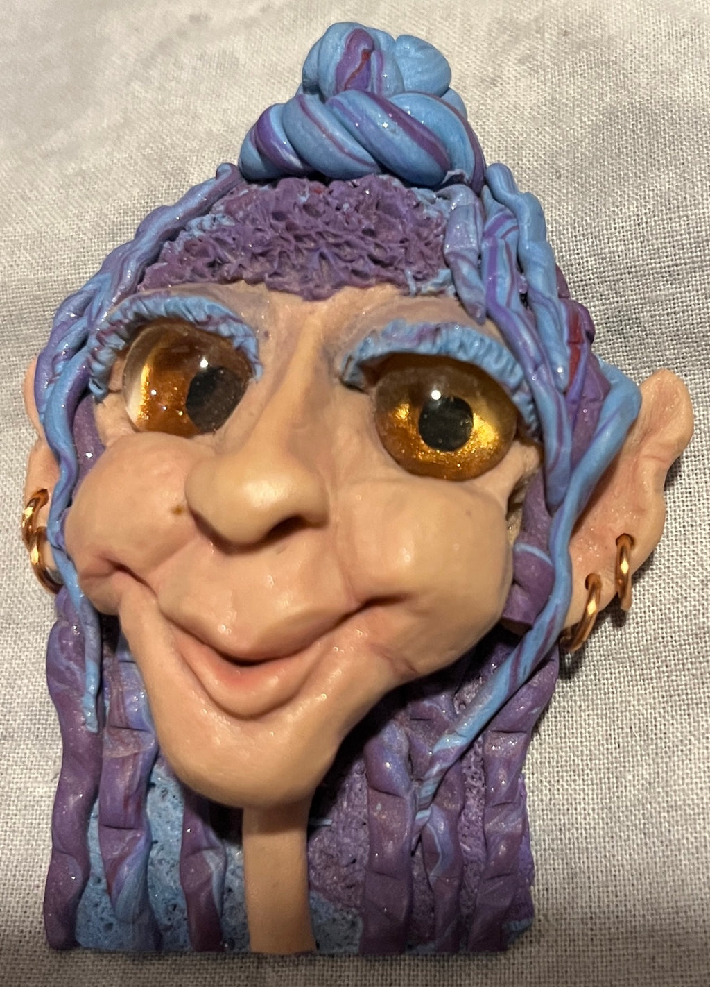 Celina hand-sculpted brooch angled portrait