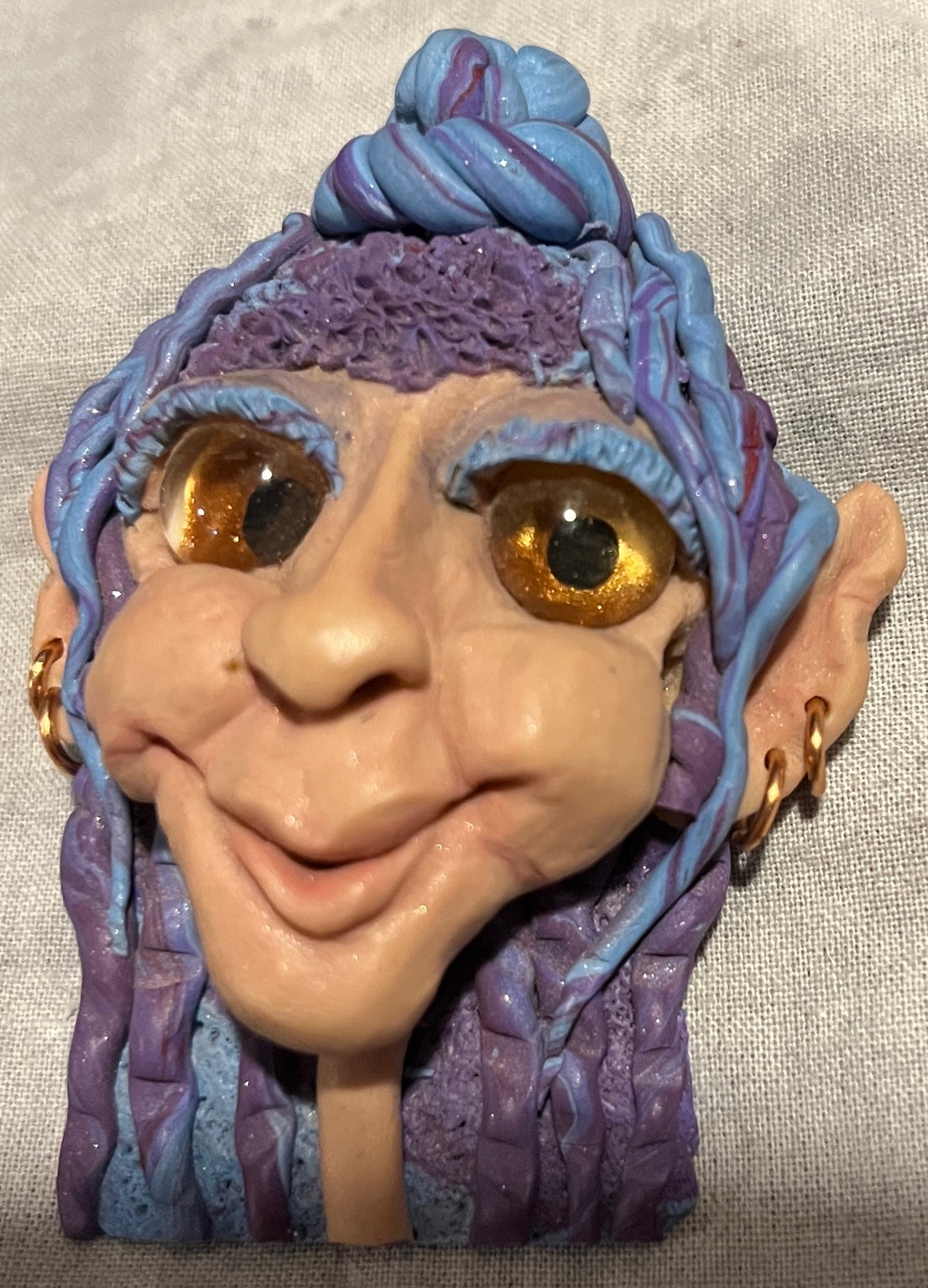 Celina hand-sculpted brooch angled portrait