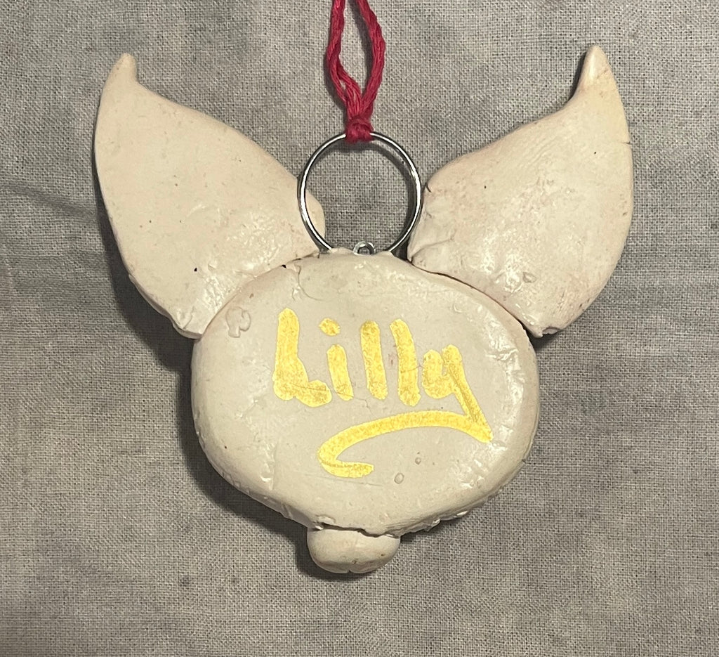 Signed back of Lilly original handmade bat pendant