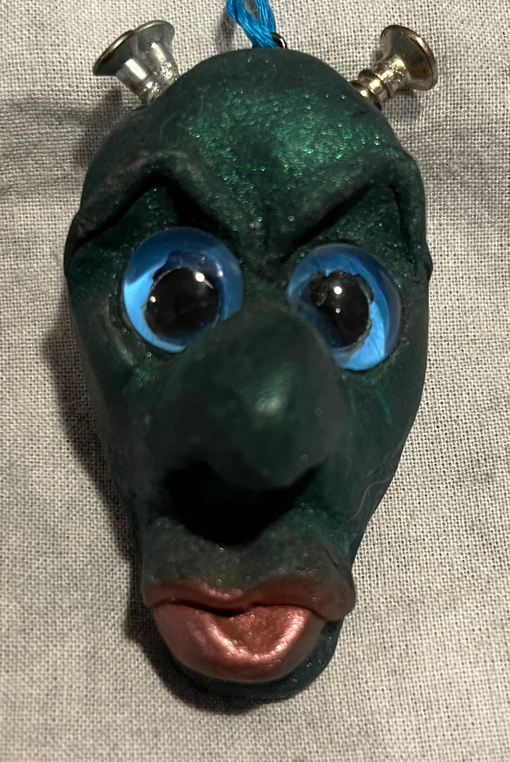 Screwball original handmade sculpted pendant, front view