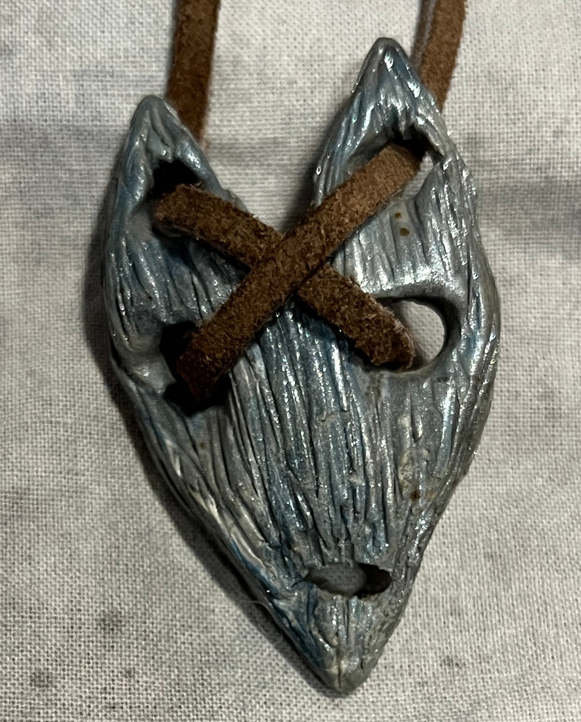 The Relic original handmade silver-blue wearable curiosity, front view