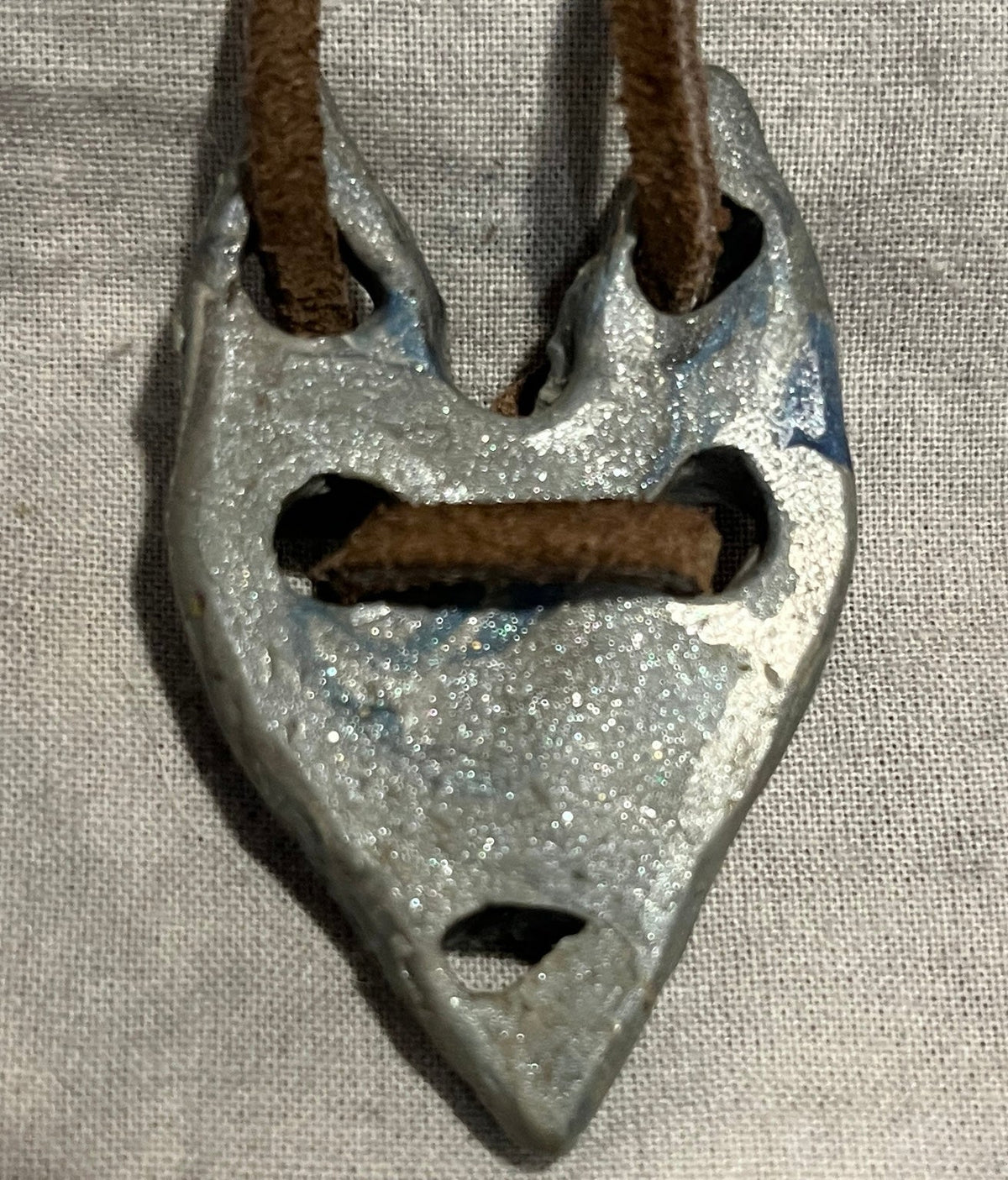 Back of The Relic handmade silver-blue pendant